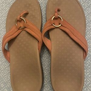 Tan Flip-Flop Sandals with Textured Soles and Metallic Detail. Size 10